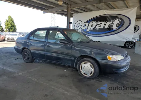 1999 Toyota Corolla Ve из США, поврежденный, VIN 1NXBR12E5XZ175615